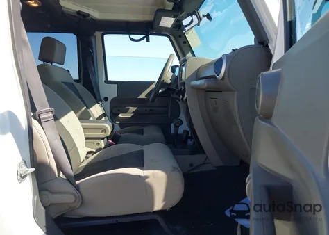 2010 Jeep Wrangler Unlimited Sahara from USA, damaged, VIN 1J4HA5H1XAL184402